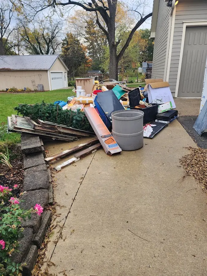 Dumpster being loaded with debris for 3 Yard Dumpster Rental in Santa Clara